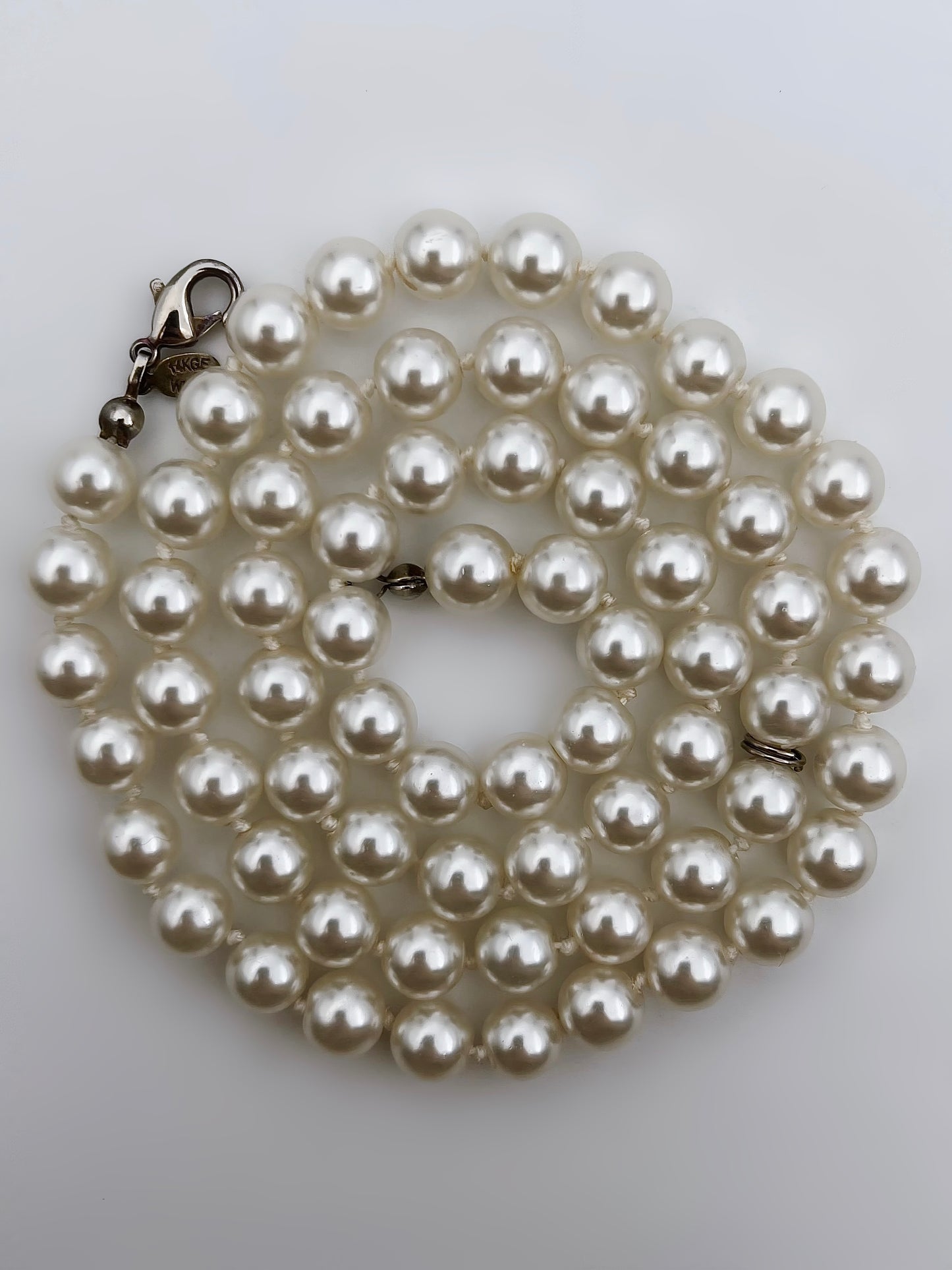 “WLIND” perlų vėrinys