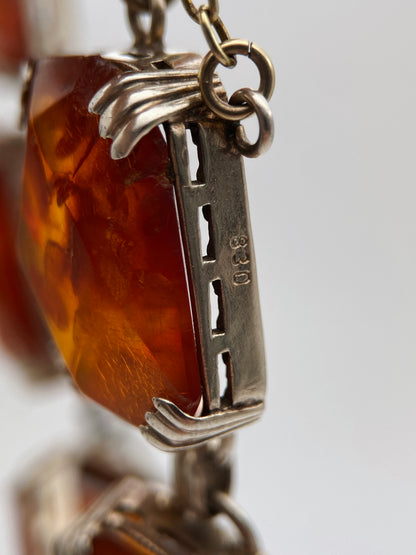 Art Deco sidabro apyrankė su presuotu Baltijos gintaru