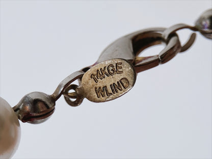 “WLIND” perlų vėrinys