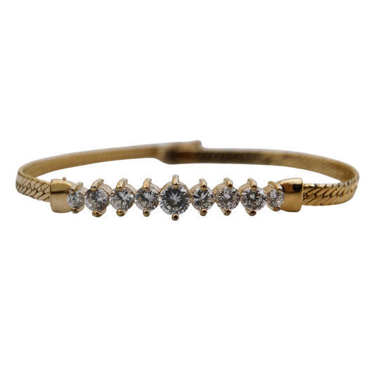 Paauksuota apyrankė su kristalais