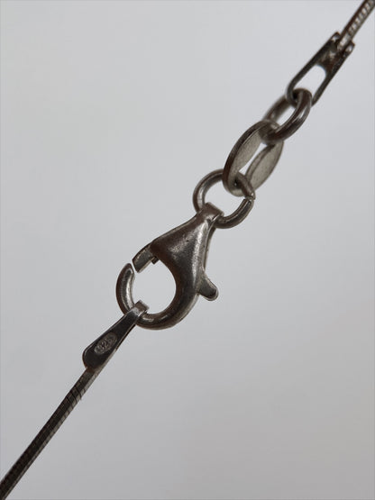 “Anderssons Gravyr & Guldsmedsverk” sidabro vėrinys