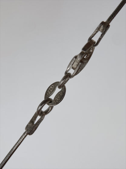 “Anderssons Gravyr & Guldsmedsverk” sidabro vėrinys