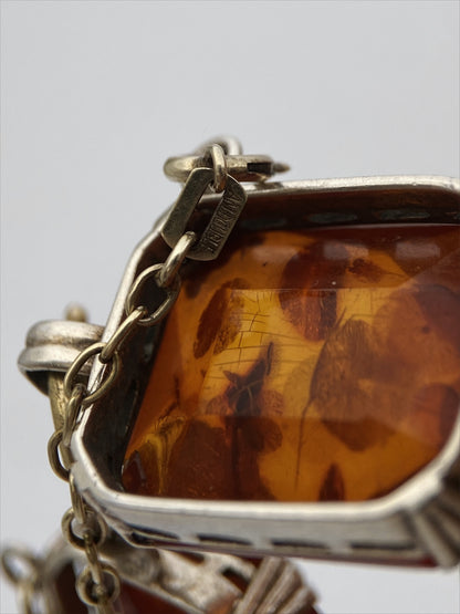 Art Deco sidabro apyrankė su presuotu Baltijos gintaru