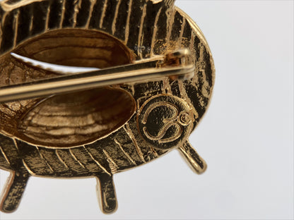 “St. John” paauksuota sagė