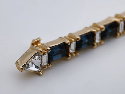 “Christian Dior" paauksuota sagė